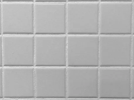 Professional tile grout cleaning results - restored white ceramic tile grout lines by Revive Floors experts